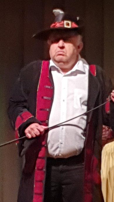 Heimatspieler in Kostüm